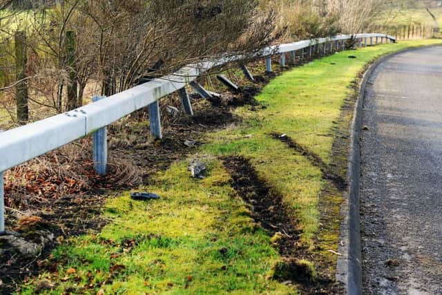 A car collided into a crash barrier on Bothkennar Road on Saturday. Picture: Michael Gillen
