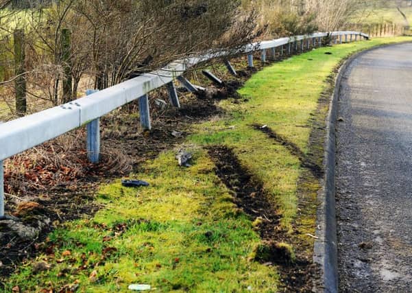 A car collided into a crash barrier on Bothkennar Road on Saturday. Picture: Michael Gillen