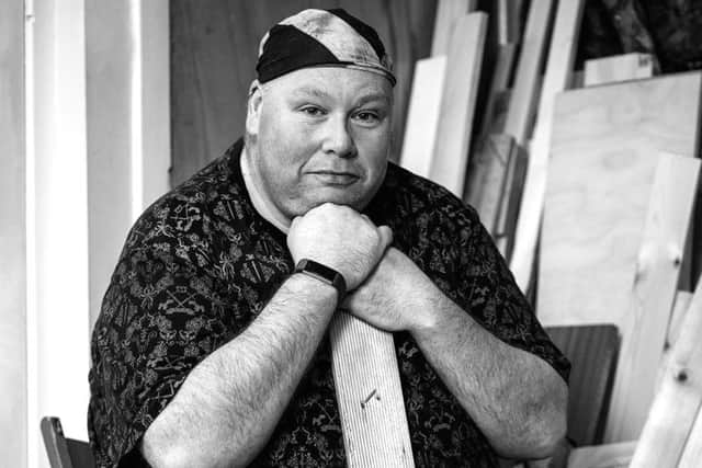 Painting a picture of homelessness today, Melissa Mitchell's portrait depicts Robert at the Men's Shed.