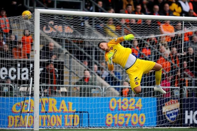 It tested Benjamin Siegrist who tipped it over for a corner.