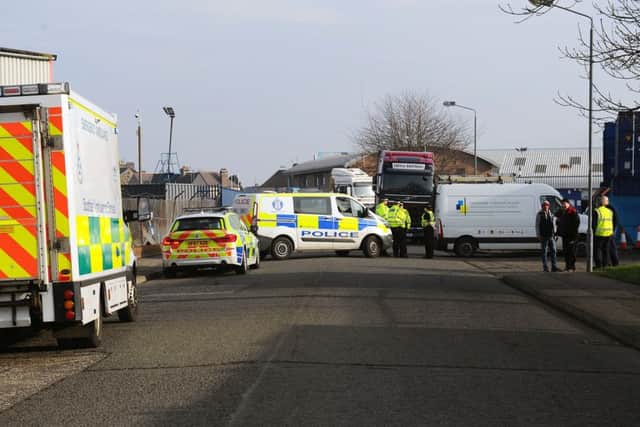 Police and paramedics attend scene of this morning's collision in Grangemouth