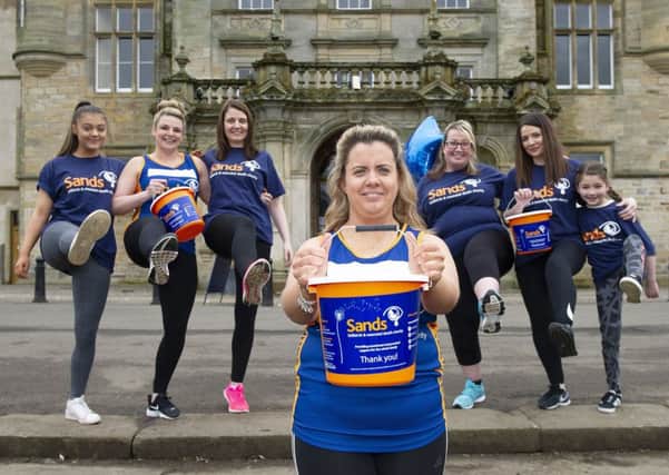 Kellie Cunningham (centre) hosted a 5K to fundraise for Forth Valley Sands