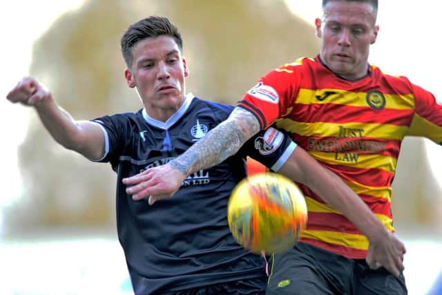 Ruben Sammut of Falkirk and Partick Thistle's Miles Storey.