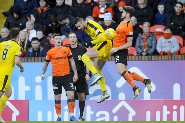 Stewart Murdoch challenges Marcus Haber earlier this season.