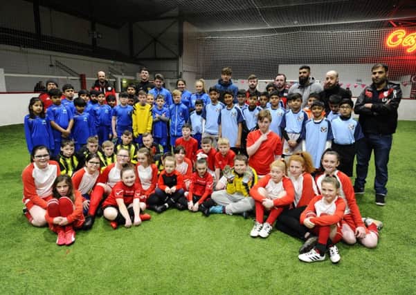 Children showed great sportsmanship at the first Al Masaar community football tournament. Picture: Alan Murray