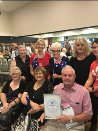 Danny Hoggan with his friends and family in Australia
