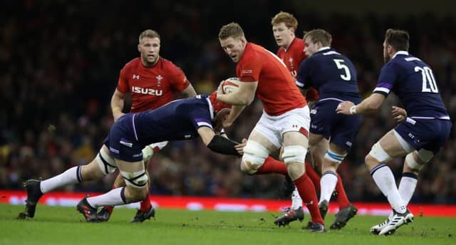 Bradley Davies of Wales charges upfield during the NatWest Six Nations match between Wales and Scotland at the Principality Stadium on February 3, 2018 (Photo by David Rogers/Getty Images)