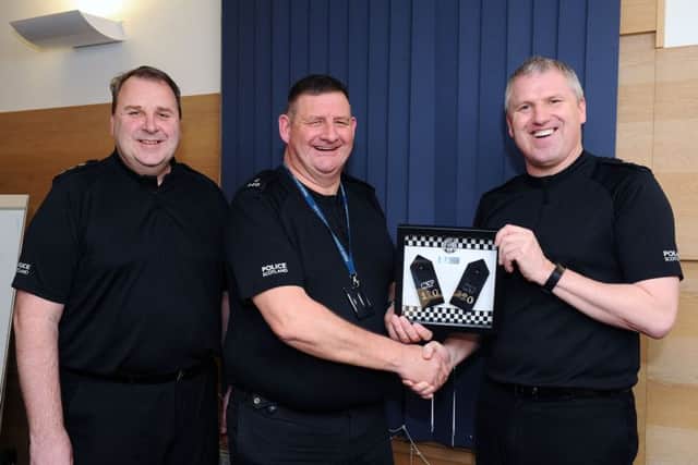 Chief Inspector Damian Armstrong (left), PC Arthur McInnes and Inspector Ewan Wilson