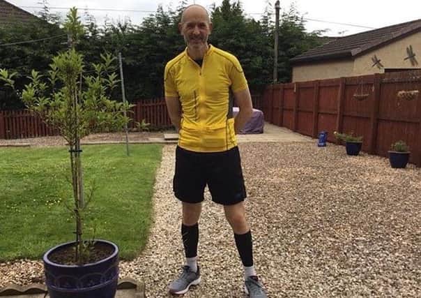 Dunipace man Andrew Sneddon, who is taking part in the Marathon des Sables foot race across the Sahara Desert on April 5 to raise cash for
Strathcarron Hospice.