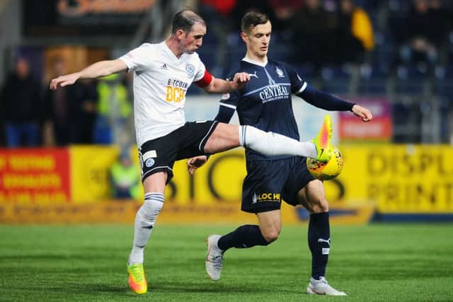 Former Bairn Mark Kerr and Deimantas Petravicius. Picture: Michael Gillen.
