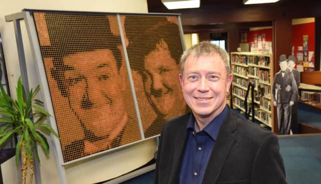 Alistair Young, a relative of the late Larbert actor, James Finlayson, unveiled the Laurel and Hardy coin mosaic in Bo'ness Library