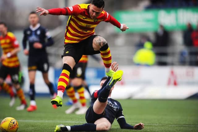 16-03-2019. Picture Michael Gillen. FALKIRK. Falkirk Stadium. Falkirk FC v Partick Thistle FC. SPFL Ladbrokes Championship. Jordan McGhee 3 catches Miles Storey 19.