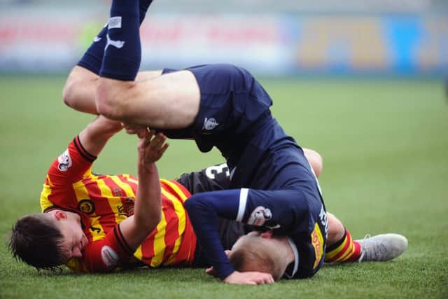 16-03-2019. Picture Michael Gillen. FALKIRK. Falkirk Stadium. Falkirk FC v Partick Thistle FC. SPFL Ladbrokes Championship. James Penrice 3 andZak Rudden 19 tangle.