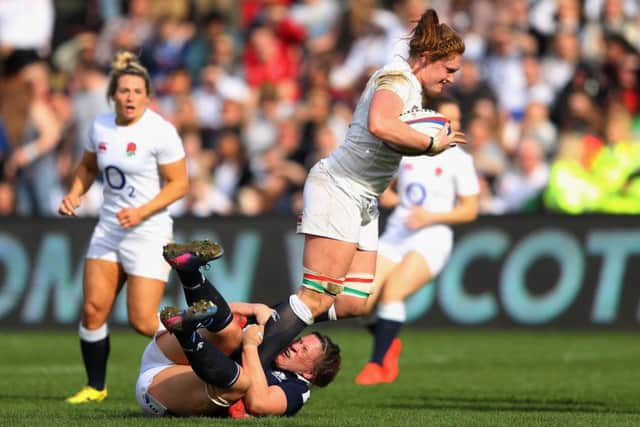 Natasha Hunt scores another try as Mairi looks on. (Photo by Laurence Griffiths/Getty Images)