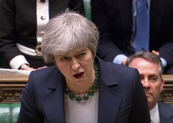 Beleaguered - Prime Minister Theresa May.
