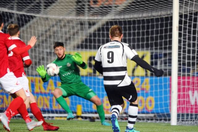 Ross Allum's shot is saved by Josh Donaldson. Picture: Michael Gillen.