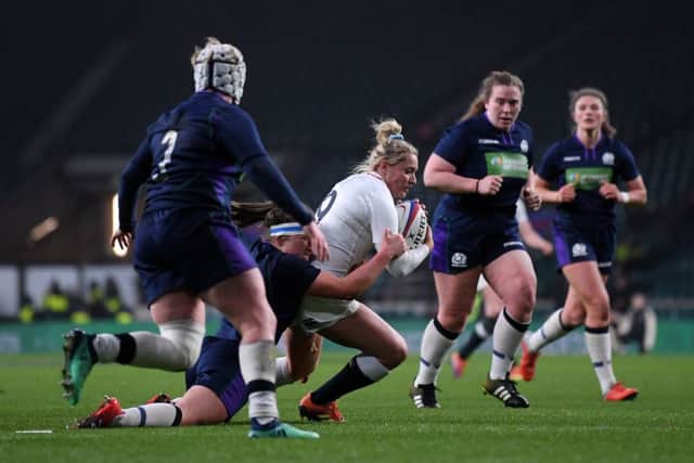 LONDON, ENGLAND - MARCH 16: Natasha Hunt of England scores her team's third try during the Women's Six Nations match between England Women and Scotland Women at Twickenham Stadium on March 16, 2019 in London, England. (Photo by Laurence Griffiths/Getty Images)