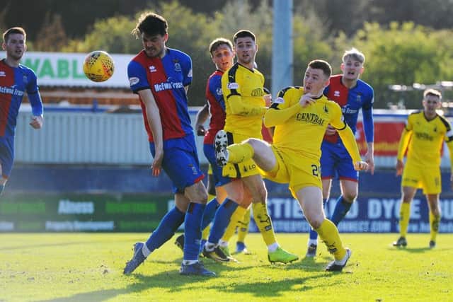 Shayne Lavery pokes one goalwards