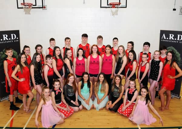 Braes High School pupils receiving their new sports uniforms from ARD Consultancy Ltd.