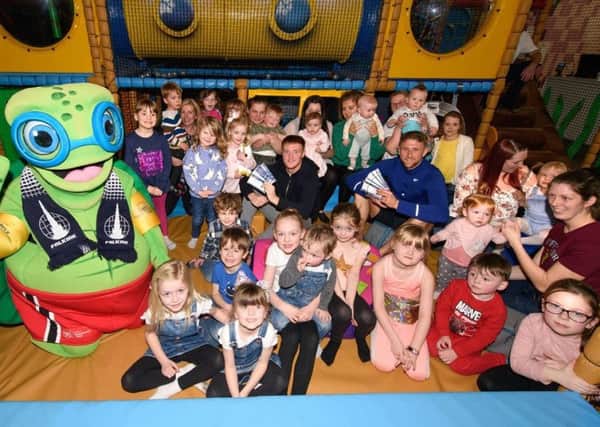 Falkirk FC players Davis Keillor-Dunn and Patrick Brough help hide the tickets in the Great Mariner Reef soft play.