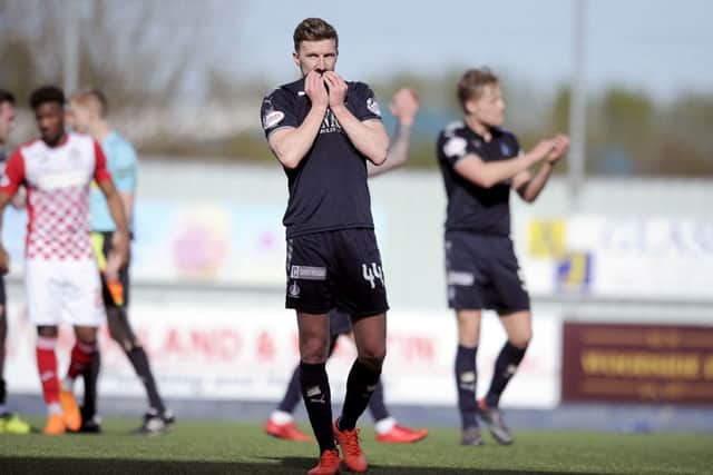 Joined that summer from Raith Rovers but left the club last year moving to Championship rivals Dundee United