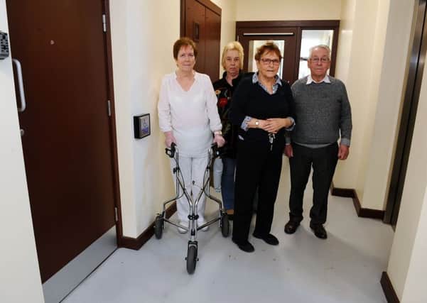Mary Kidd, Lyn Millree, Catherine McIntyre and John Kidd are fed up asking for help to keep their building clean