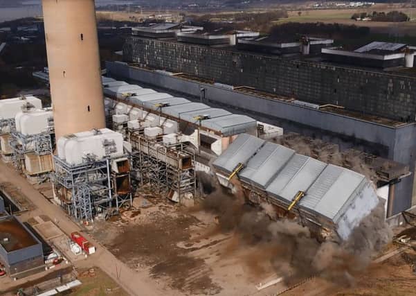 This was the scene at Longannet a year ago this week, when a steel precipitator structure was demolished in a controlled explosion. Twelve months later site clearance is still a work in progress.
