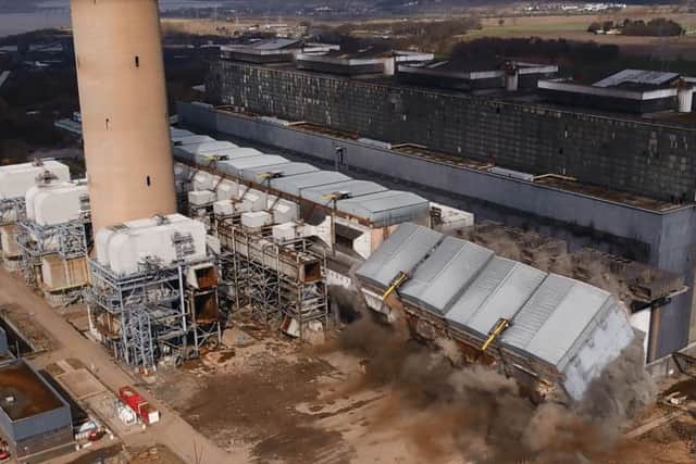 This was the scene at Longannet a year ago this week, when a steel precipitator structure was demolished in a controlled explosion.  Twelve months later site clearance is still a work in progress.