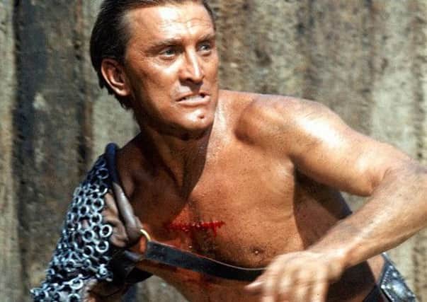 Kirk Douglas as Spartacus.