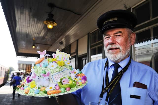 Station Master Bill Lord with the lost Easter bonnet