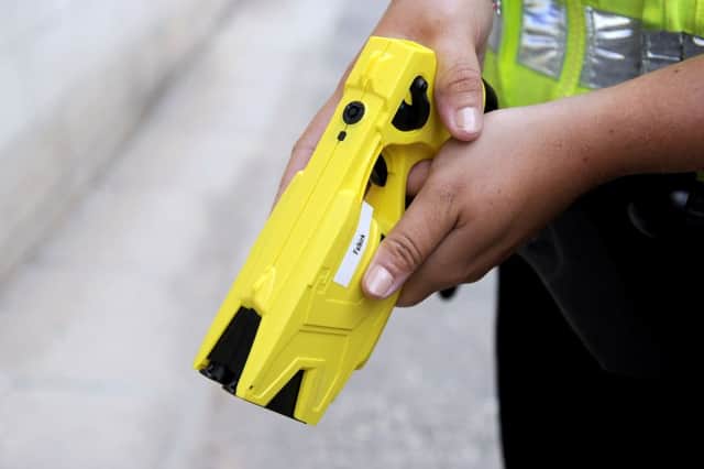 Specially trained police officers were first deployed with Tasers in June last year. Pic: Michael Gillen.