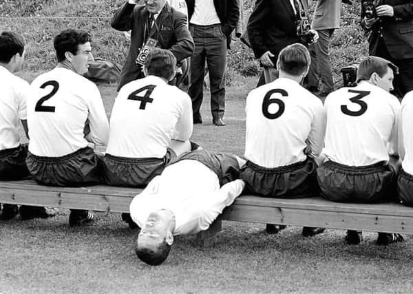 MYSTERY PIC: Who is this trying to mess up the team photo?