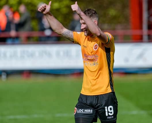 Jubilant Andy Munro (Stenhousemuir) celebrates after the Scottish League 1 match between Brechin City and Stenhousemuir at Glebe Park, where a draw was enough to see Brechin City relegated to League 2.

(c) Dave Johnston