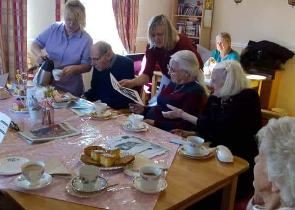 Time for tea...and memories at Bankview Care Home in Banknock where the Oscar-themed Care Words session was a box office success with residents.