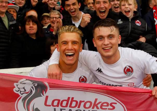 Tom Lang celebrates with Mark Lamont after Clyde's win at the weekend. Picture: Scott Loudon.