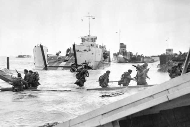 Royal Marine Commandos storming Juno Beach on June 6, 1944