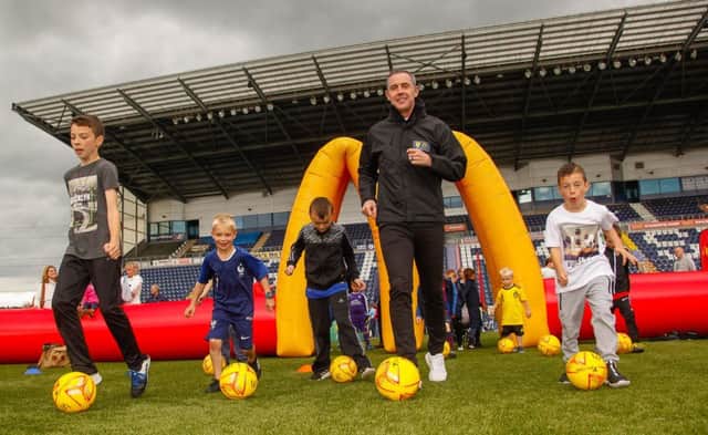 Children's Football Festival. Falkirk Stadium 16/06/19 Children complete 6 activities and can send off for a free leather football. Davie Weir came along to help with the activities