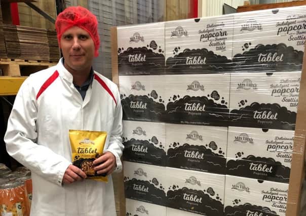 Mrs Tilly's managing director Blair Paterson with the new product - tablet covered popcorn