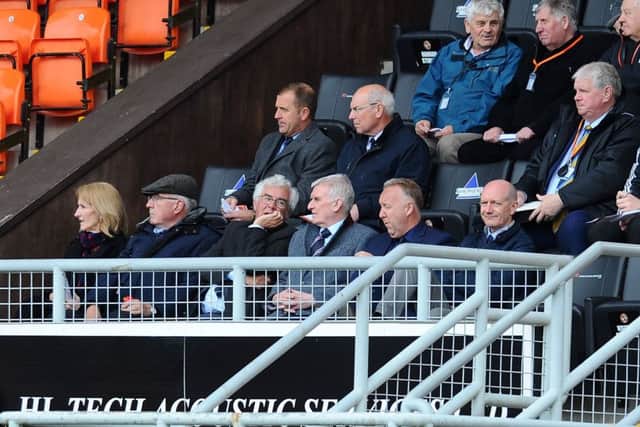 Kevin Beattie watching a Bairns match at Tannadice with Alex Totten