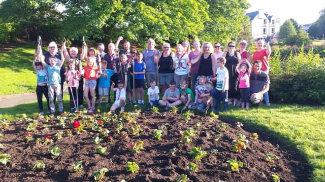 Some of the green fingered participants in the planting operation.