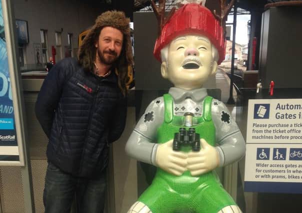 Former Graeme High School pupil Andy MacVicar with his Tom Weir tribute Oor Wullie sculpture