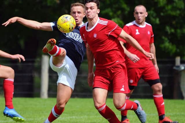 Ross MacLean and former Falkirk player Ciaran McKenna (pic by Michael Gillen).