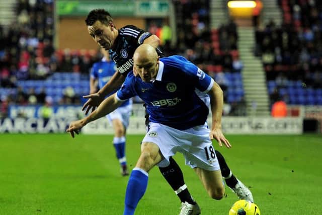 He joined Wigan from Kilmarnock for a reported fee of £600,000 before leaving to join Derby County one season later for £1.2 million