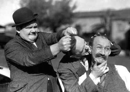 James Finlayson, right, in classic form with Laurel and Hardy in Big Business (1929).