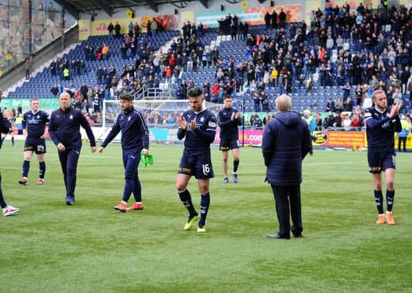 Falkirk's players after last season's relegation