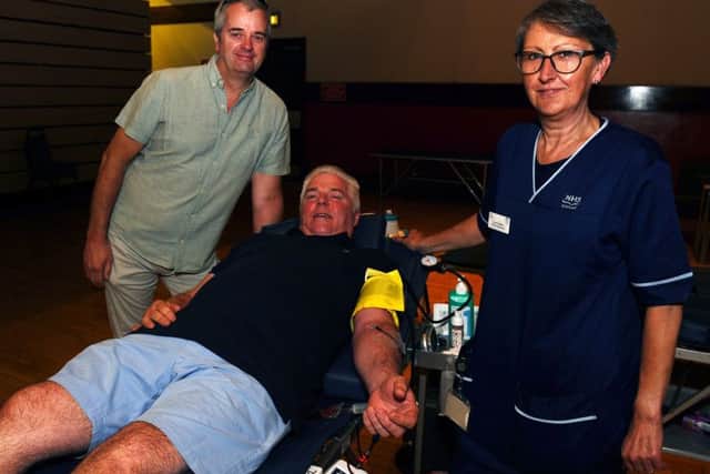 There's nothing to fear...Andrew gave his 131st donation at Falkirk Town Hall on Monday, where we also met up with his brother Steven and and senior charge nurse Suzanne Milliken. (Pic: Michael Gillen)