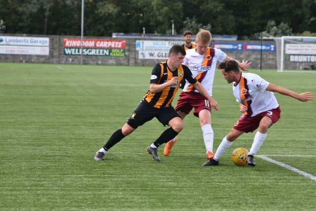 Aaron Dunsmore is challenegd by Alan Cook