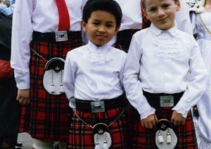 Frank, left, as a page boy at Sacred Heart back in 1989.