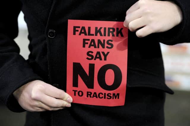 Falkirk fans funded their own red card display to respond to claims of racism at a game in November. Picture Michael Gillen.