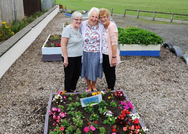 Thornwood Tenants and Residents Association members Mary McDonald, Margaret Gardiner and Liz Godfrey in the Westfield Park Community Centre garden they helped to revamp